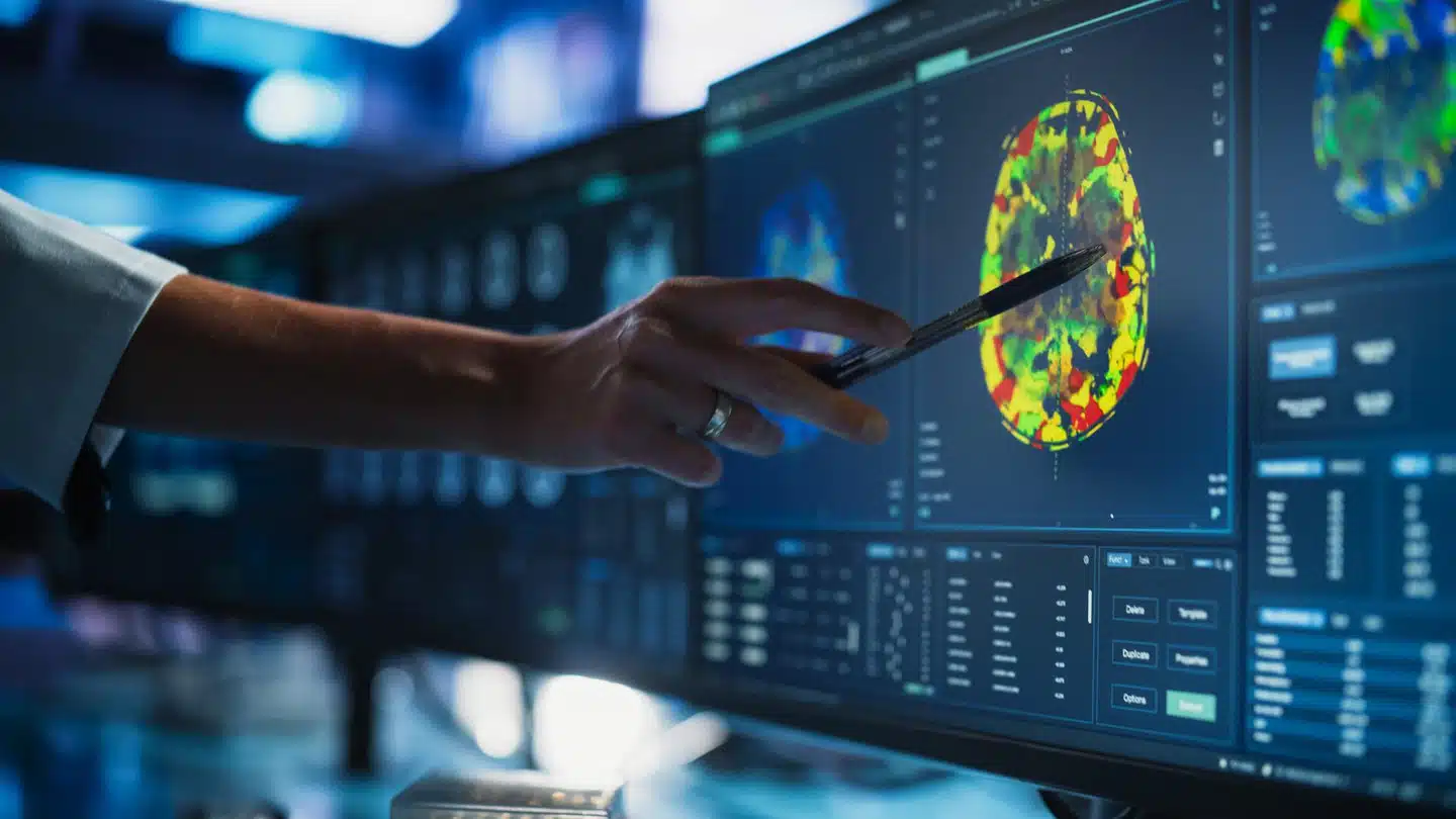Analyzing brain scan on computer screen