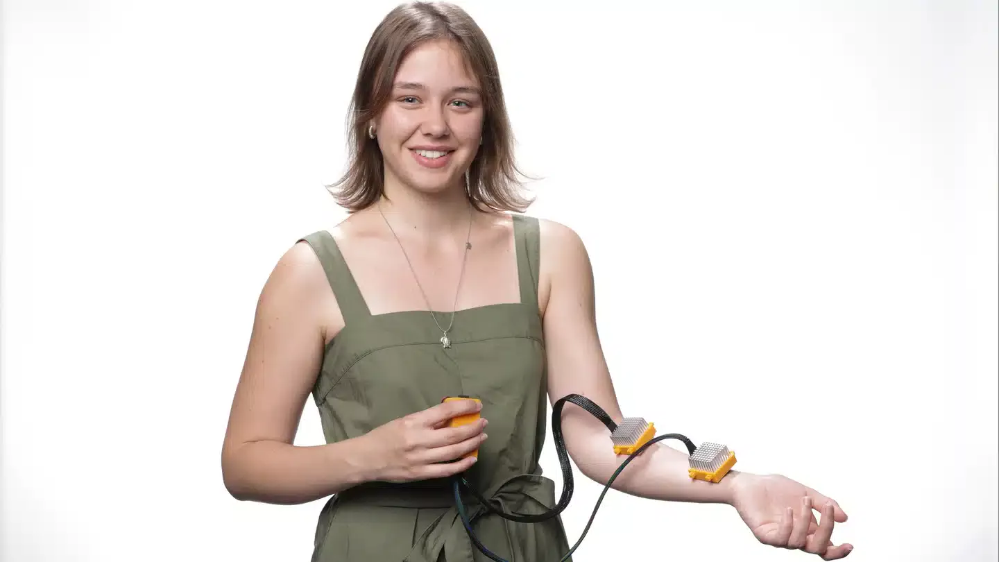 Person with innovative arm device.